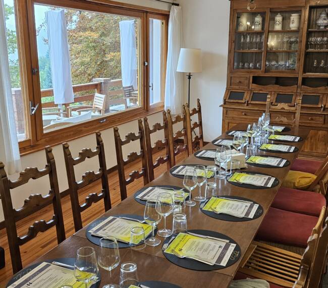 Dining room table set for a family of twenty, luxury chalet in Barzio, Lake Como