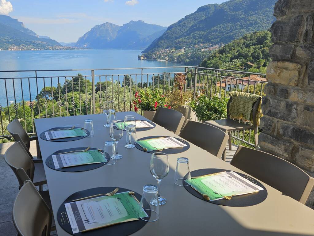 Private Chef Lake Como - dinner table set on a terrace with a lake view